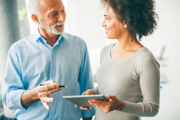 A landlord discussing lease terms with a new tenant